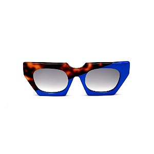 Óculos de Sol Gustavo Eyewear G137 3. Cor: Animal print e azul opaco. Haste animal print. Lentes cinza.