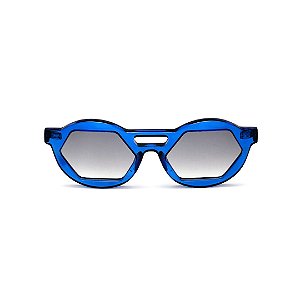 Óculos de Sol Gustavo Eyewear G134 5. Cor: Azul translúcido. Haste animal print. Lentes cinza.