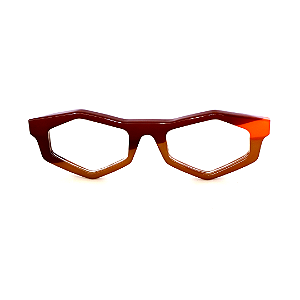 Óculos de Grau Gustavo Eyewear G153 6 nas cores marrom, doce de leite e laranja, com as hastes pretas. Origem