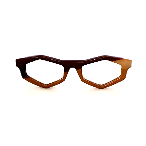 Óculos de Grau Gustavo Eyewear G153 9 nas cores marrom, caramelo e doce de leite, com as hastes Animal Print. Origem
