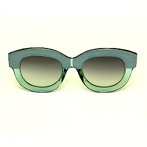 Óculos de Sol Gustavo Eyewear G12 5 nas cores prata e acqua, com as hastes pretas e lentes cinza. Outono Inverno.