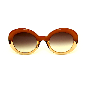 Óculos de Sol Gustavo Eyewear G61 3 nas cores doce de leite e âmbar, hastes em animal print e lentes marrom degrade.
