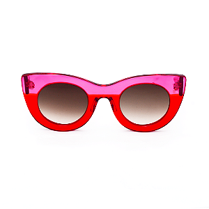 Óculos de Sol Gustavo Eyewear G48 6 em rosa e vermelho, hastes rosas e lentes cinza.