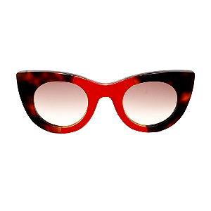 Óculos de Sol Gustavo Eyewear G48 2 em Animal Print e vermelho. Hastes em Animal Print e lentes marrom degrade.