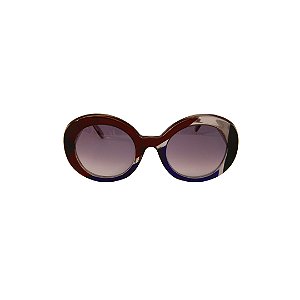 Óculos de Sol Gustavo Eyewear G61 2. Cor: Vermelho, azul, preto e fumê translúcido. Haste fumê translúcido. Lentes cinza.