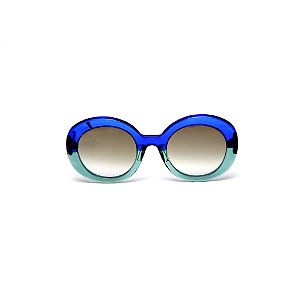Óculos de sol Gustavo Eyewear G61 18. Cor: Azul e acqua translúcidos. Haste azul. Lentes cinza.