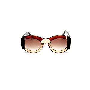 Óculos de sol Gustavo Eyewear G60 7. Cor: Âmbar, marrom translúcido e preto.. Haste preta. Lentes marrom.