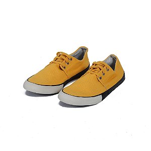 tenis osklen amarelo