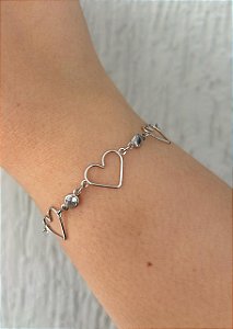 Pulseira de aço três corações vazados e zircônias