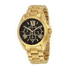 relogio michael kors dourado fundo preto