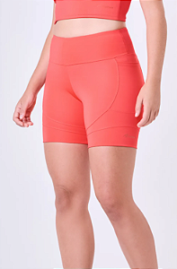 BERMUDA ESSENTIAL RUN TROT 3 BOLSOS 15CM HIBISCUS