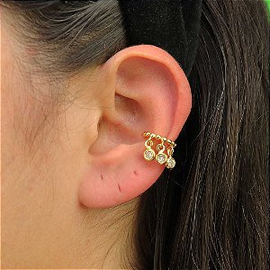 Piercing feminino com mini esferas e ponto de luz