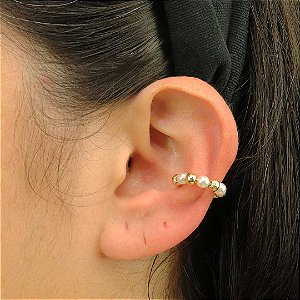 Piercing feminino de pérolas e esferas em ouro