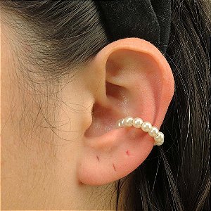 Piercing feminino de pérolas tradicionais