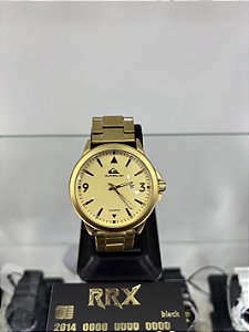Relógio Quiksilver Dourado fundo Dourado
