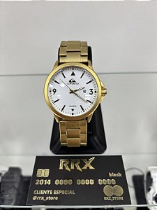 Relógio Quiksilver Dourado fundo Branco