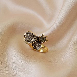 Anel ajustável Morena Canela hibisco pétalas strass black diamond ouro semijoia