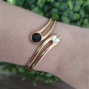 Bracelete Ajustável com detalhe pedra cristal e preta valquiria folheado em ouro ( serve até pulso 18 cm)