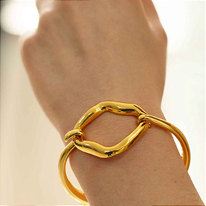 Bracelete Articulado com  detalhe oval em orgânico folheado em ouro  ( serve até pulso 19 cm)