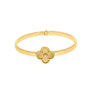 Bracelete articulado com detalhe de trevo sem resina com strass folheado em ouro  ( serve até pulso 18 cm)