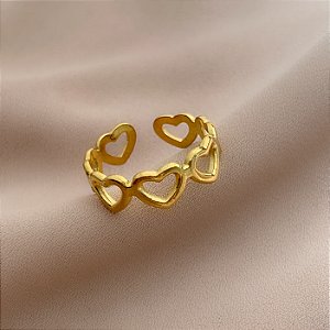 ANEL REGULÁVEL CORAÇÕES ENFILEIRADOS VAZADOS DOURADO AÇO 316L⭐️