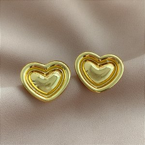 BRINCO CORAÇÃO BORDA BOLEADA DOURADO AÇO 316L⭐️