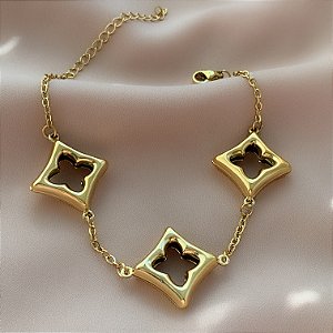 PULSEIRA DETALHES QUADRADOS TREVOS VAZADOS DOURADO AÇO 316L⭐️