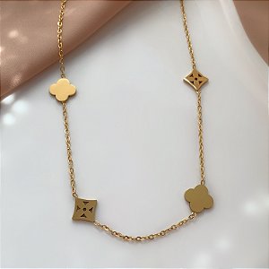 COLAR TREVOS DIFERENTES DOURADO AÇO 316L⭐️