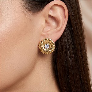 BRINCO MARGARIDA COM PEDRA ZIRCÔNIA DOURADO AÇO 316L⭐️