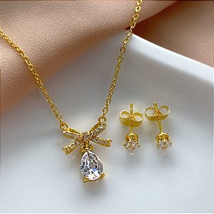 CONJUNTO BRINCO E COLAR LAÇO GOTA ZIRCÔNIAS DOURADO AÇO 316L⭐️
