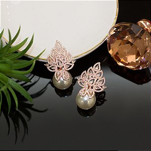 Brinco pérola e microzircônias