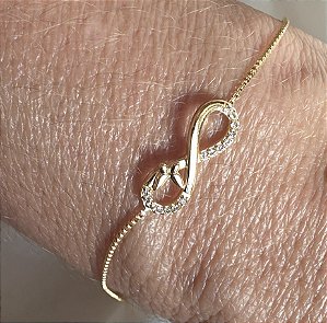 PULSEIRA INFINITO COM ZIRCONIAS BANHADA A OURO 18K