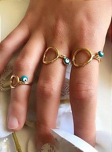 ANEL AJUSTAVEL COM OLHO GREGO BANHADO A OURO 18 K OU RODIO