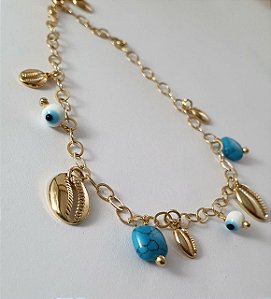 TORNOZELEIRA TROPICAL COM BUZIOS E OLHO GREGO BANHADA A OURO 18 K