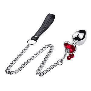 PLUG ANAL DE METAL CROMADO COM JOIA EM FORMA DE CORAÇÃO COM SINOS E CORRENTE COM GUIA P CORES
