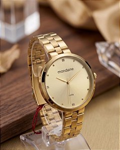 Relogio feminino Mondaine dourado 32672LPMVDE1