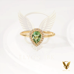 Anel em ouro 18k com esmeralda gota natural e 21 diamantes naturais