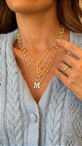 Colar letra S pérola dourado