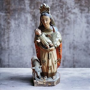 Antiga imagem sacra fatura primitiva em madeira policromada.