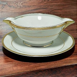 Molheira em porcelana Limoges branca filetada a ouro.