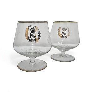Par de taças para cognac com friso dourado.