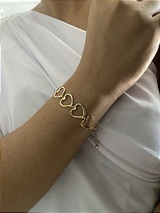 PULSEIRA MULTI CORAÇÕES- DOURADA