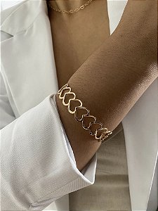 BRACELETE CORAÇÕES DOURADO