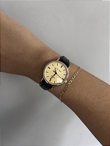 RELÓGIO CLASSIC- PRETO FUNDO DOURADO