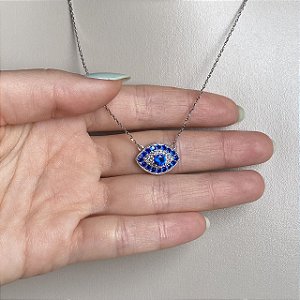 Colar olho grego cravejado com zircônias cristal e azul em prata 925 com banho de ródio branco