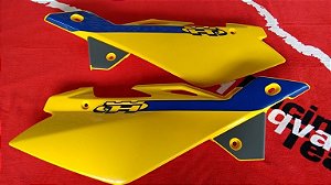 Tampas laterais do banco Husqvarna WR 125