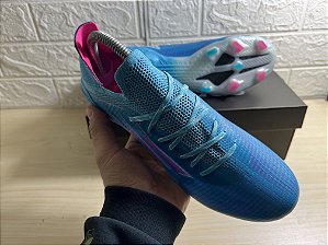 chuteira adidas vermelha e azul