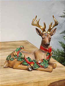 RENA DEITADA MARROM COM FESTÃO NATALINO 27CM