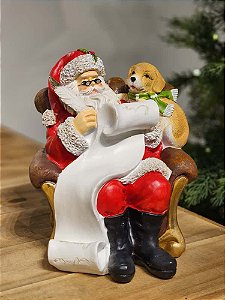 PAPAI NOEL SENTADA NA POLTRONA COM CACHORRO 19CM