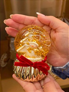 GLOBO DE NEVE DOURADO COM LAÇO BONECO DE NEVE 9,5CM - PRÉ VENDA 2026